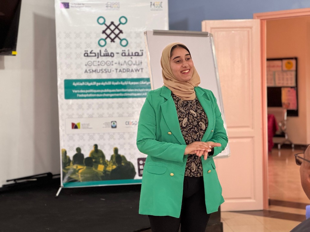 Presentation in front of ASTA project banner — inclusive territorial public policies for climate change adaptation