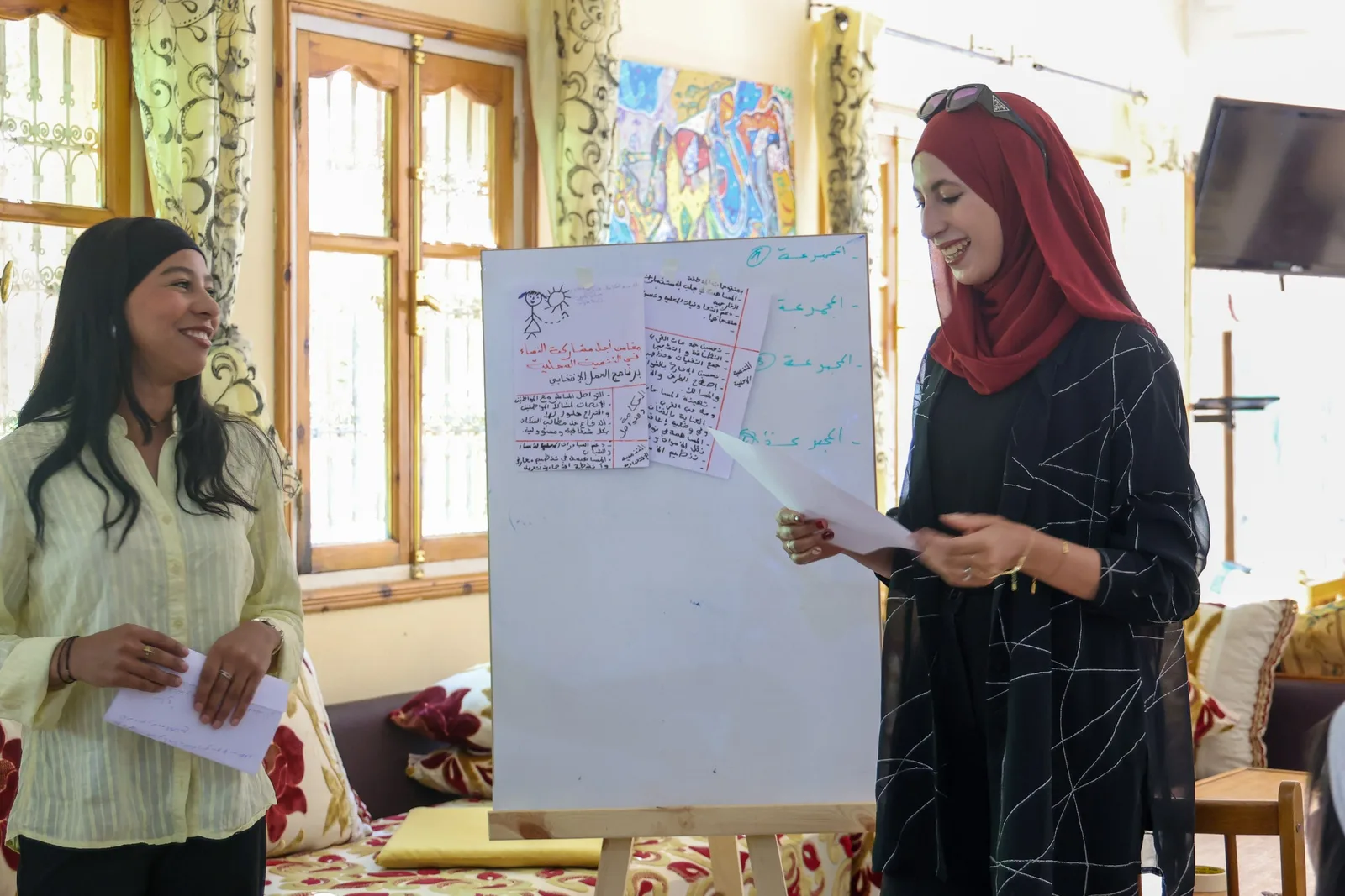 Participants present the results of a group exercise