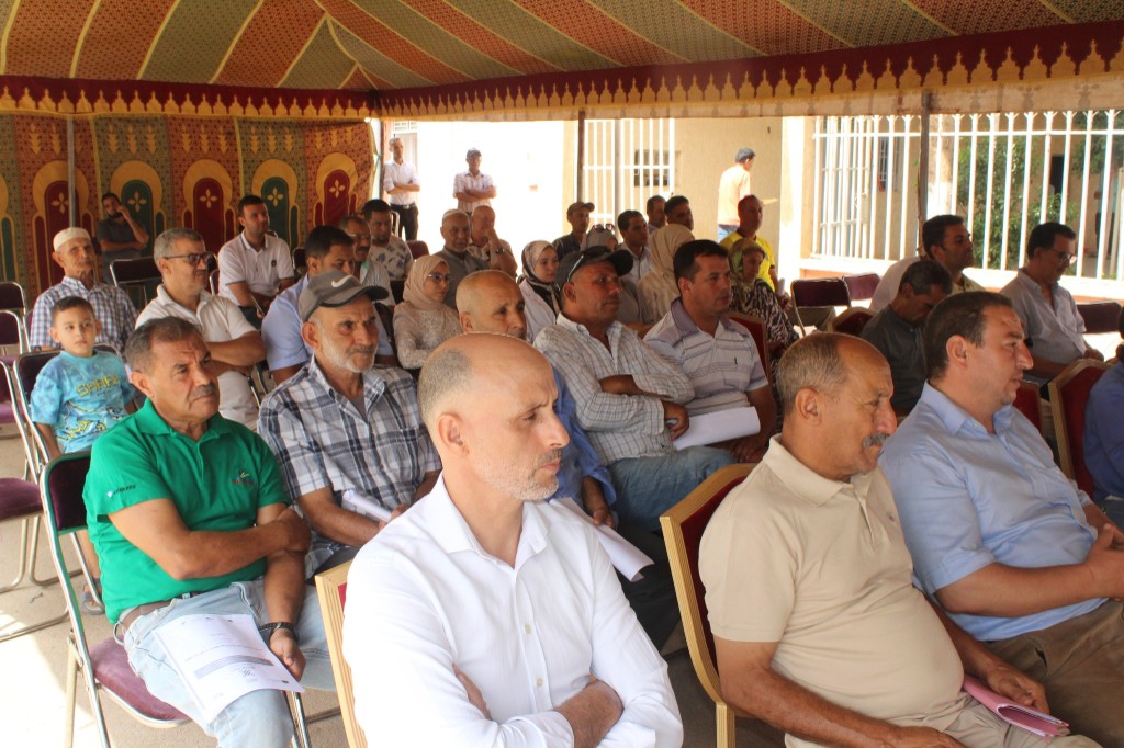 Participants in the meeting under the tent — AMUSSU project and European Union